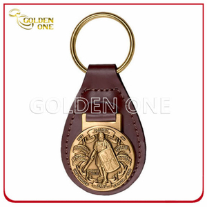 Personalisierter Schlüsselanhänger aus Leder mit geprägtem Emblem aus antikem Messingmetall