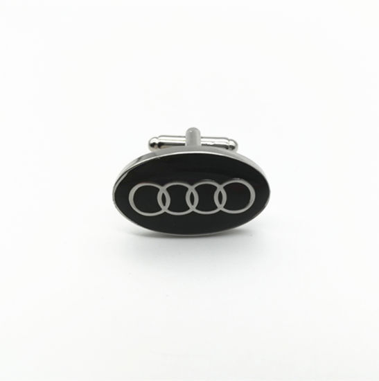 Personalisierter, vergoldeter Manschettenknopf aus Metall mit Prägung