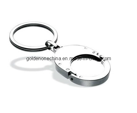 Schlüsselanhänger aus drehendem Metall in Form eines Hauses